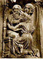 Job getting a little Feedback from his wife (archivolt from the West [King's Heads] Portal of the North Porch)
